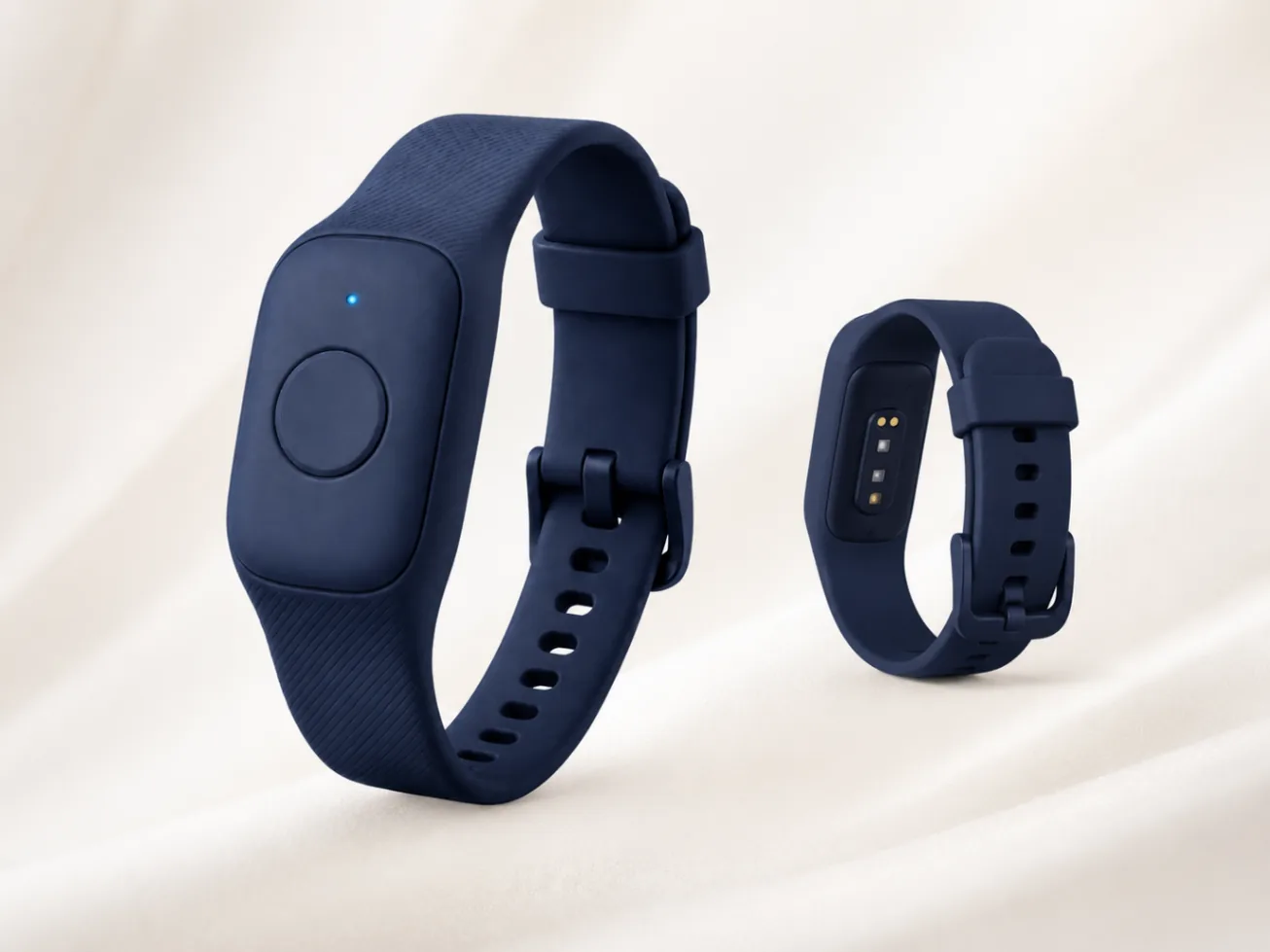 Mini Guard studio product overview showing the matte navy wristband with SOS button and charging back